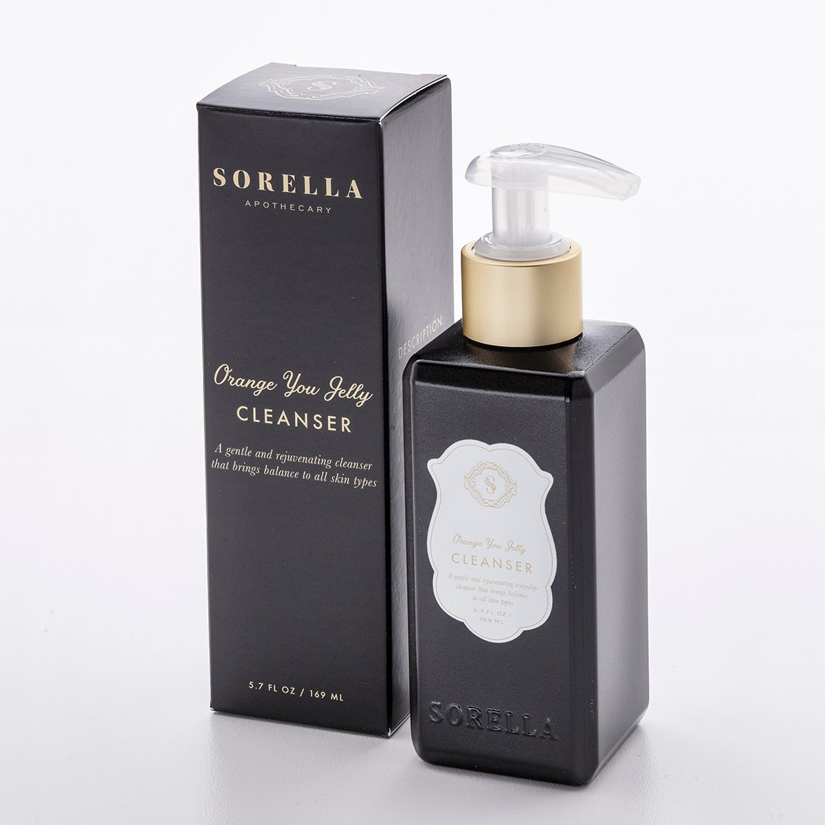 A black pump bottle with a clear cap labeled 'Sorella Apothecary Orange you Jelly Cleanser' next to its packaging box.
